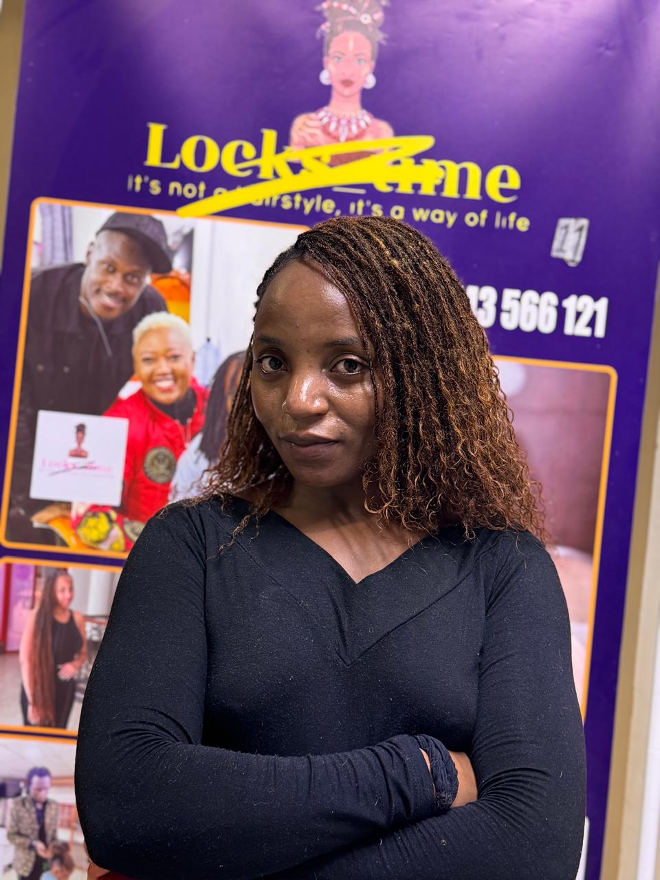 Rich auburn human hair Sisterlocks extensions on client at Locstime254