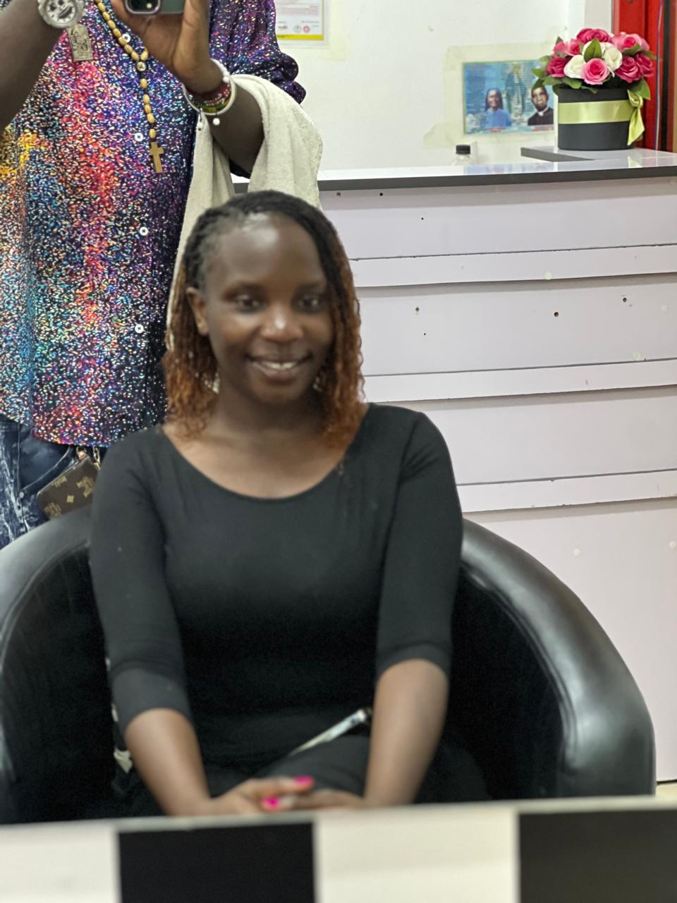 Client with fresh human hair Sisterlocks extensions install