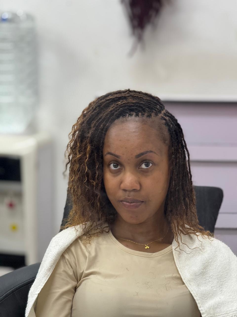 Long ombre human hair Sisterlocks extensions with curly finish